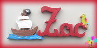 Plaque de porte prenom lettres bois bateau pirate et perroquet